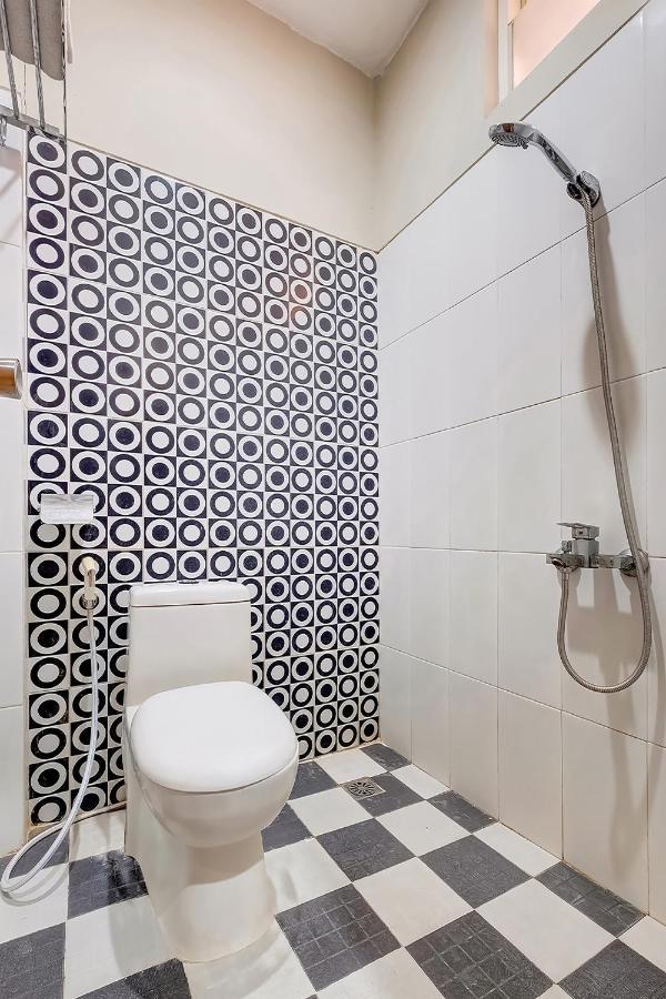 Oyo Flagship 3726 Tembok Batu Residence Tugu 外观 照片
