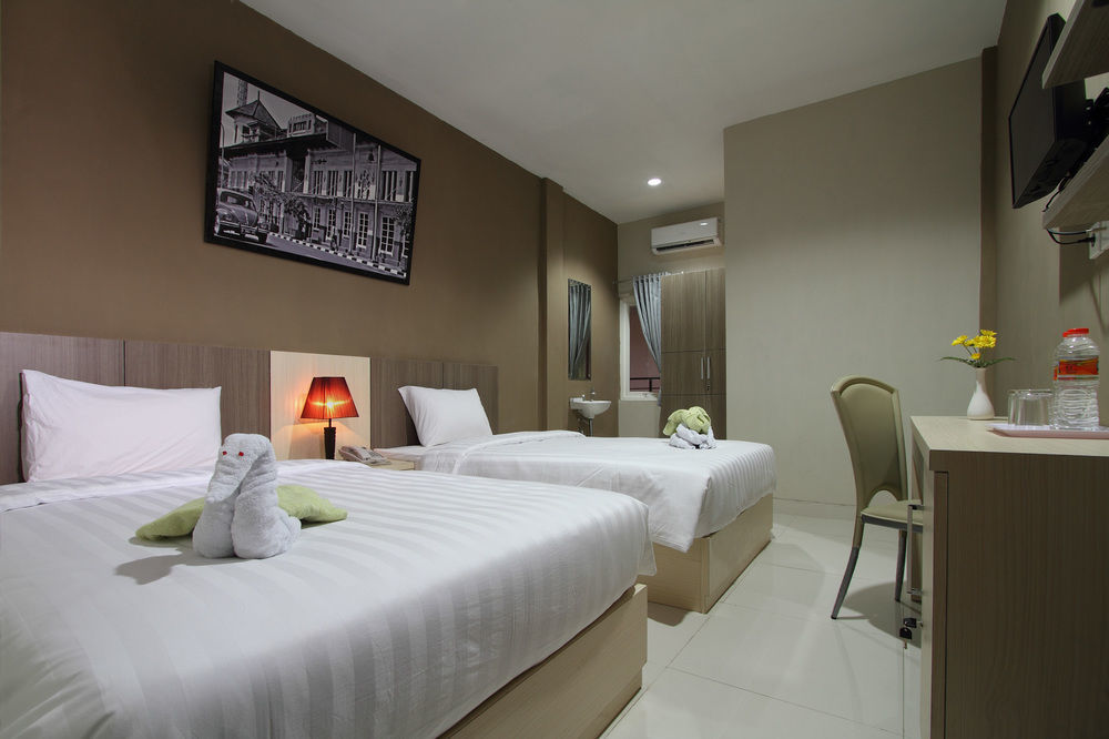 Oyo Flagship 3726 Tembok Batu Residence Tugu 外观 照片